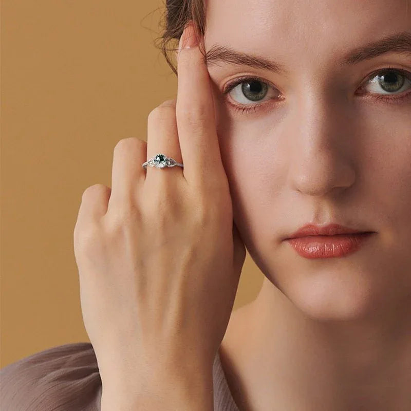 Round Six-Prong Moss Agate Leaf Shoulder Open Ring — ring worn on the hand
