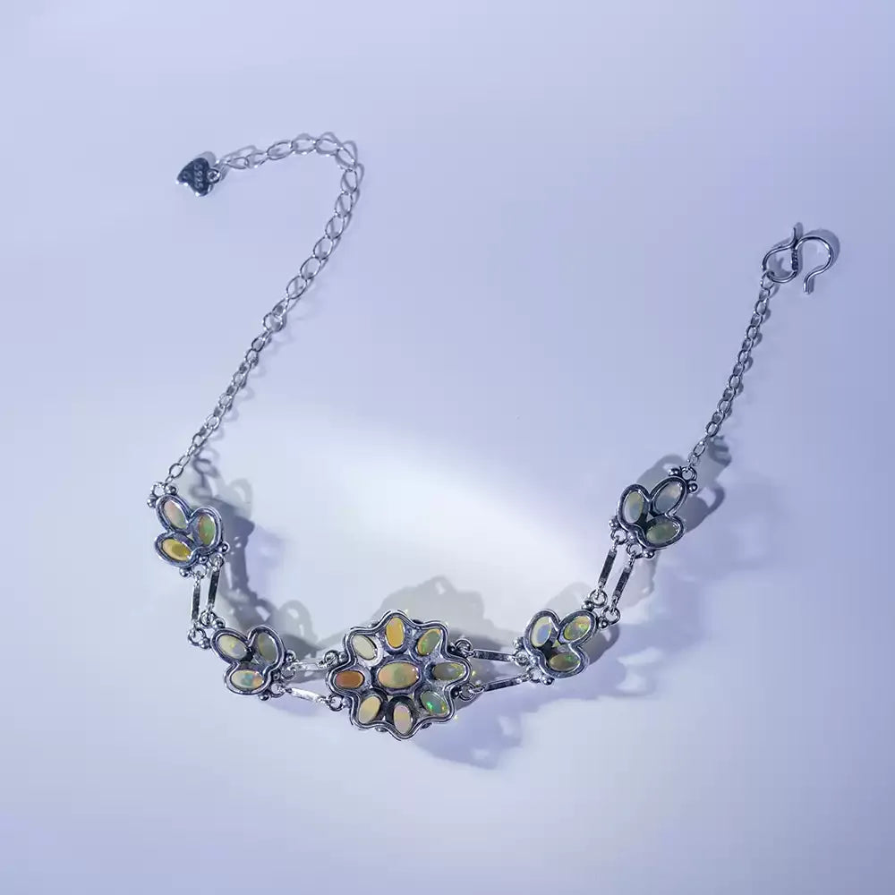 Opal Floral Station Bracelet worn on the wrist