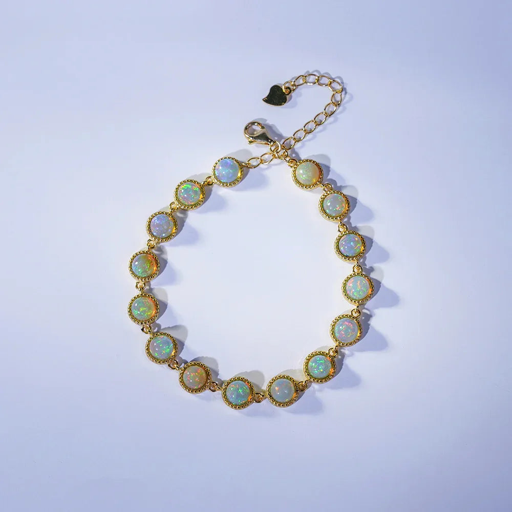 Opal Round Station Bracelet bracelet arranged on a display