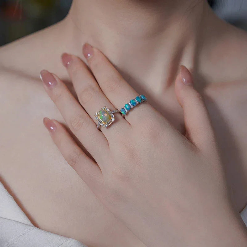 Opal Two-Tone Floral Halo Adjustable Ring worn on the hand