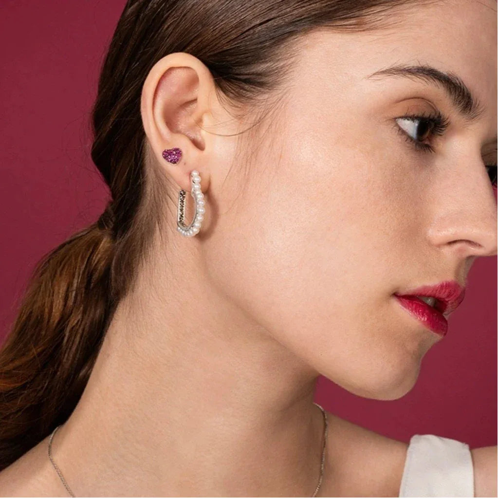 Pearl-Lined Open Heart Earrings — right-ear worn side portrait