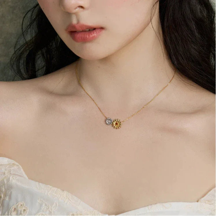 Orange Garnet Two-Tone Floral Necklace worn at the neckline from a second angle