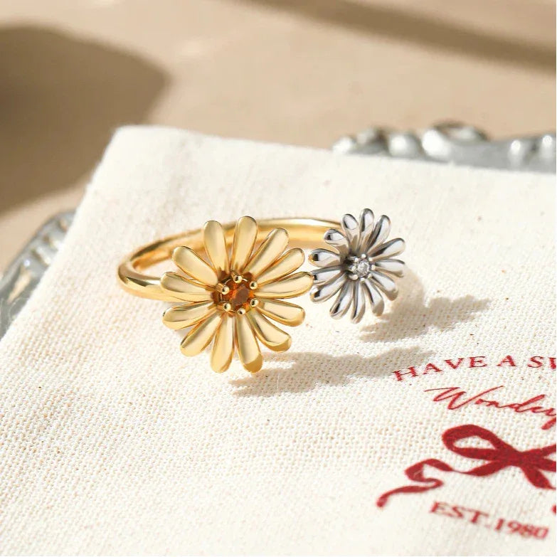 Orange Garnet Two-Tone Floral Open Ring angled product detail on a jewelry display