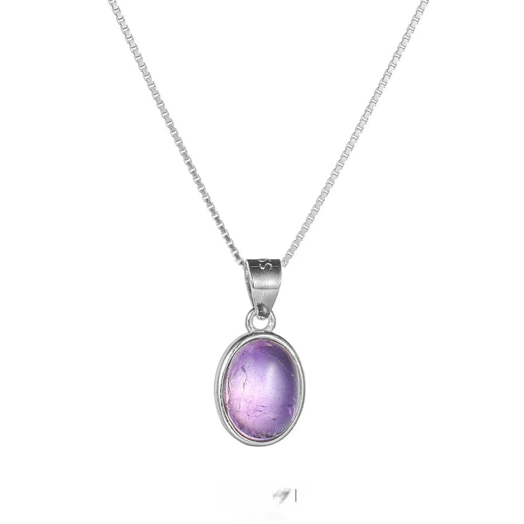 oval amethyst cabochon necklace second neckline view in soft light