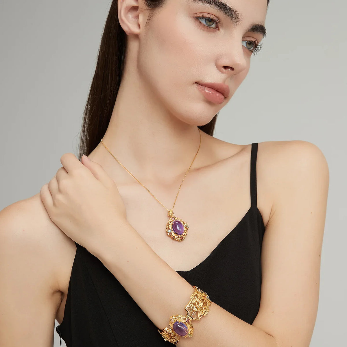 oval amethyst filigree pendant necklace styled model view showing pendant scale