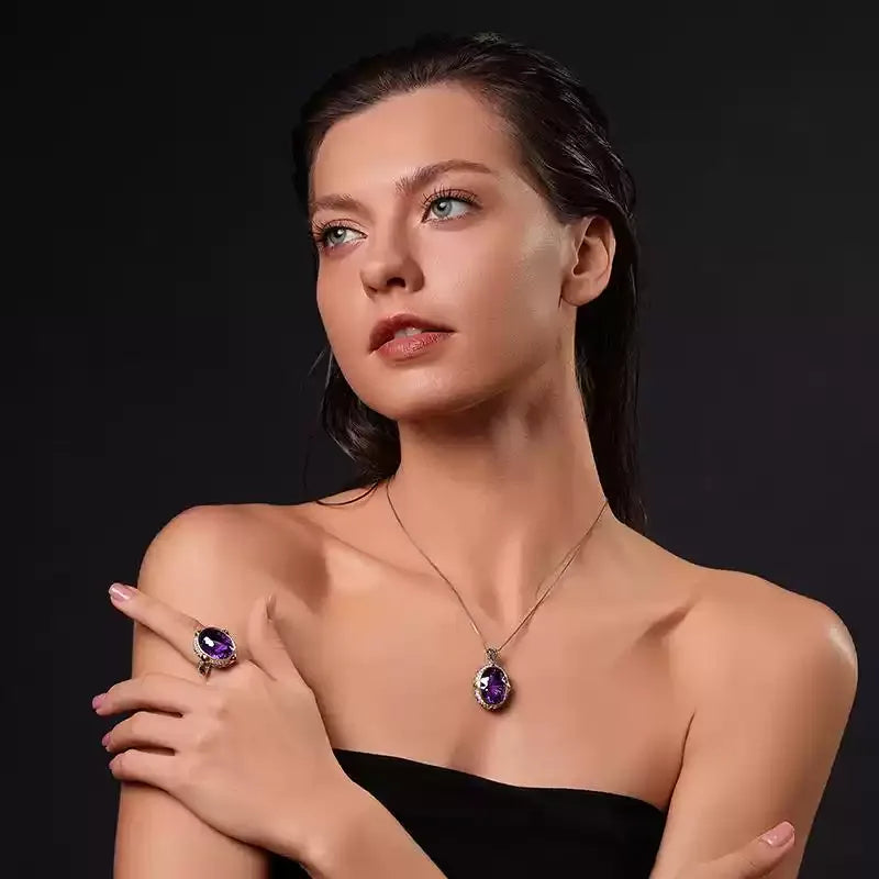 oval amethyst multigem ring styled portrait showing the ring for scale