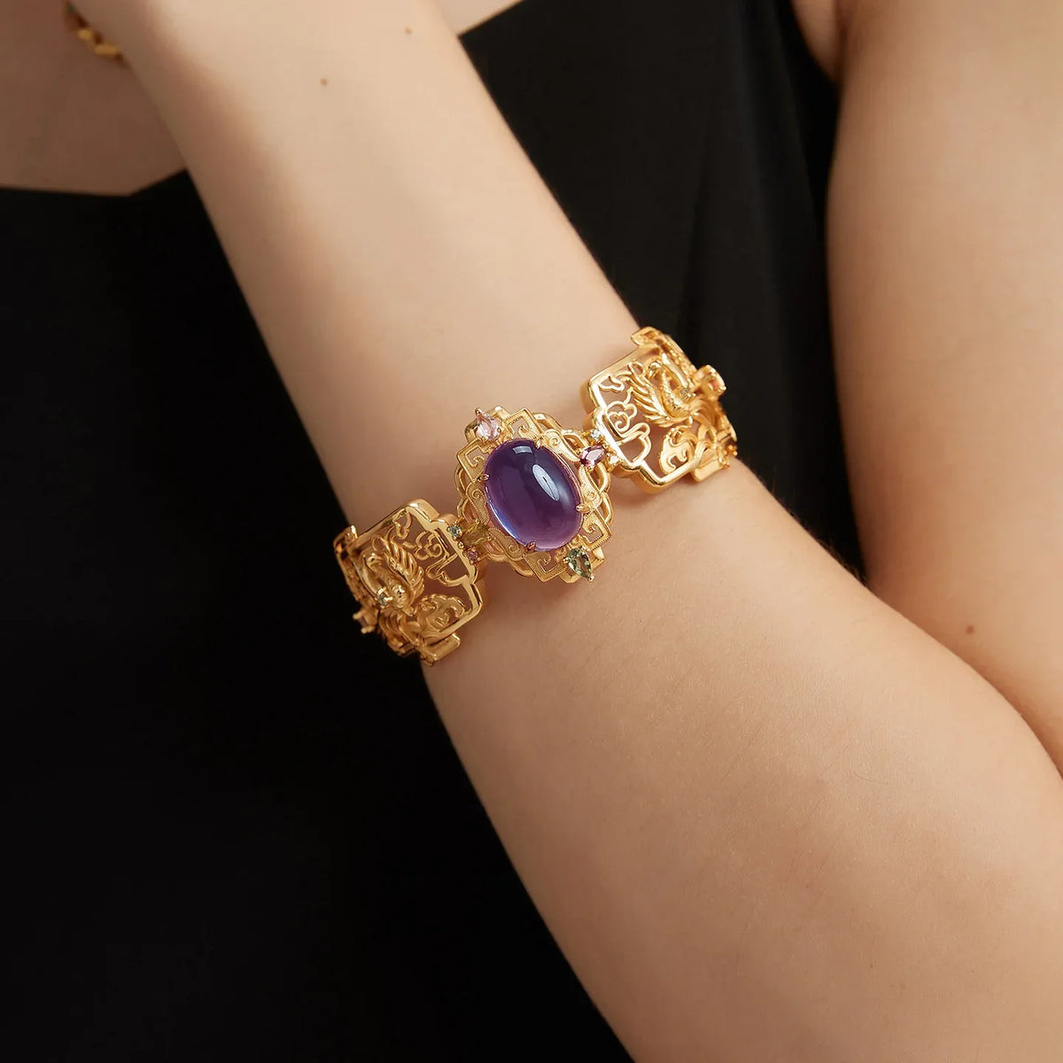 oval amethyst openwork bracelet worn on the wrist in a close-up