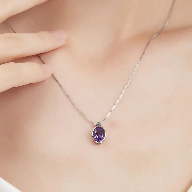 oval amethyst pendant necklace second neckline view in soft light