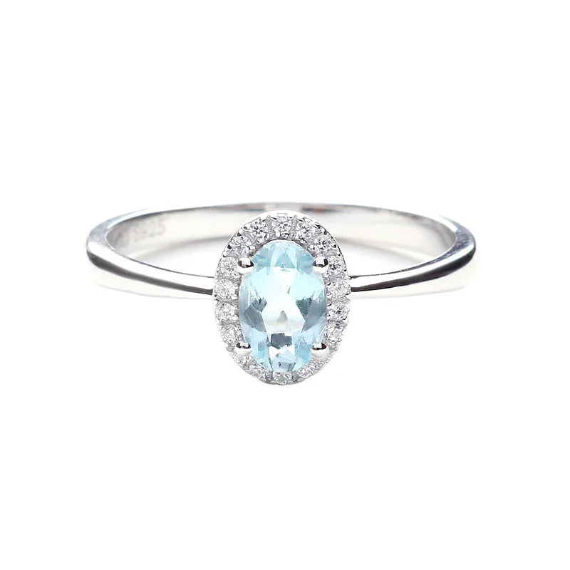 Oval Aquamarine Bezel-Set Ring angled product view showing the setting