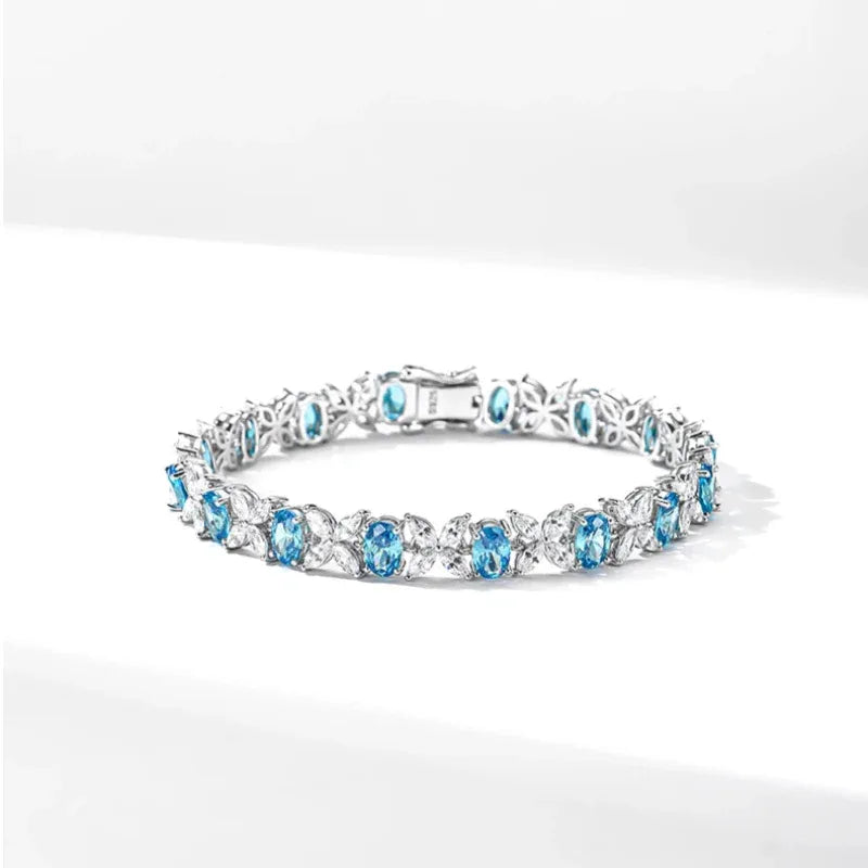 Oval Aquamarine Butterfly-Link Bracelet angled bracelet detail on white