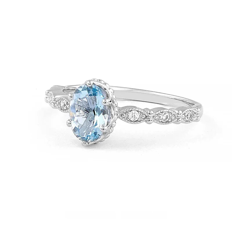 Oval Aquamarine Crown Accent Ring side profile showing the band and setting