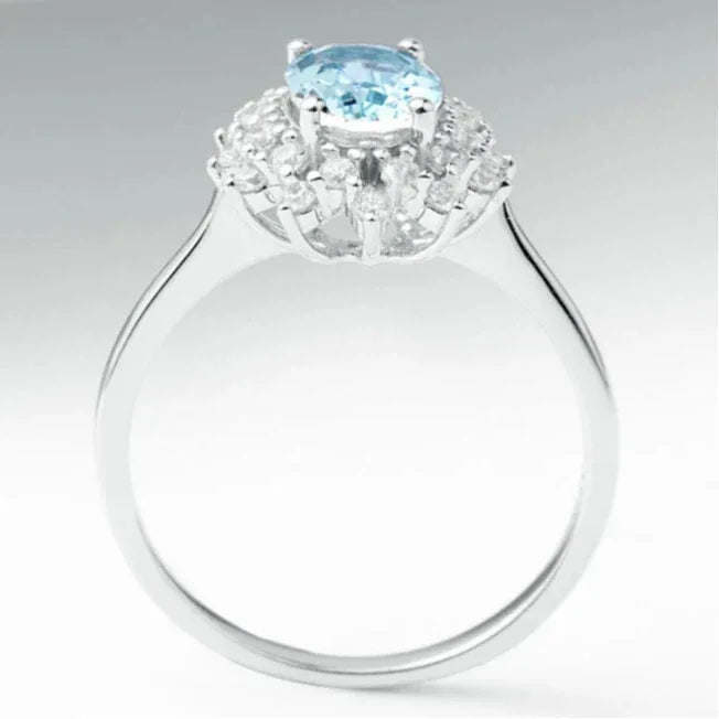 Oval Aquamarine Halo Ring angled product view showing the setting