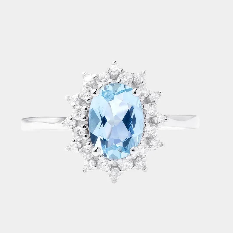 Oval Aquamarine Halo Ring front product view on a white background