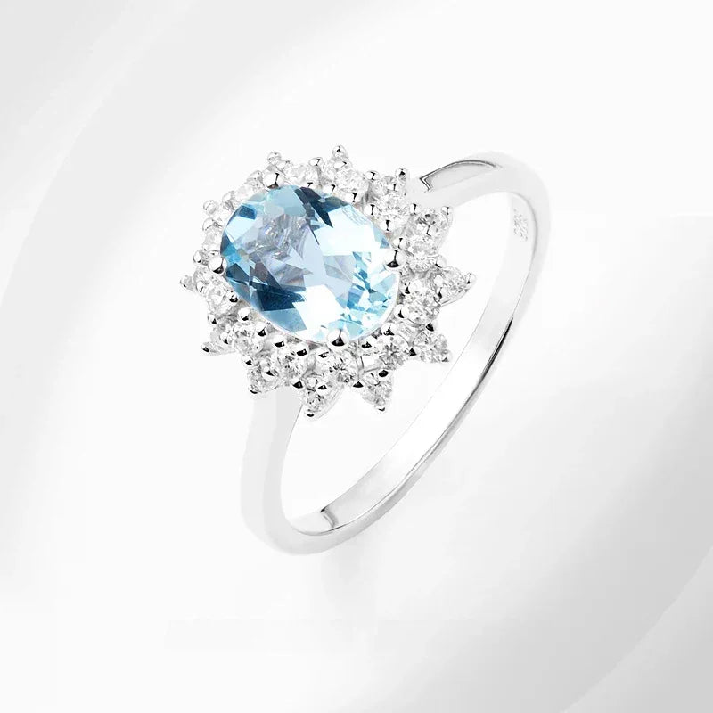 Oval Aquamarine Halo Ring side profile showing the band and setting