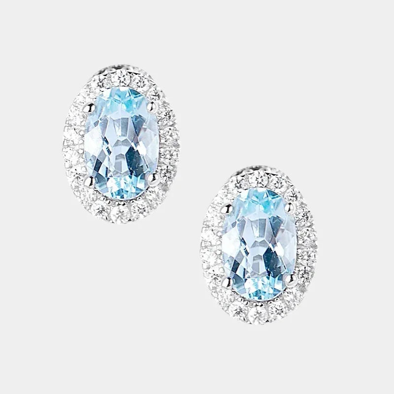 Oval Aquamarine Halo Stud Earrings paired product view on a white background