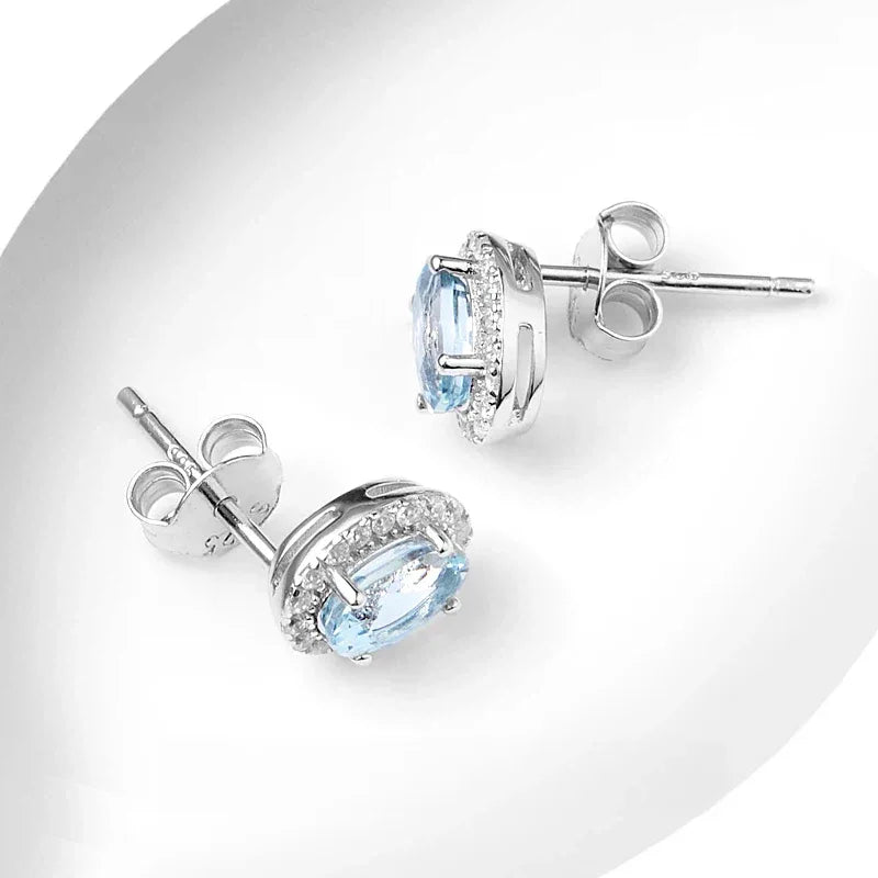 Oval Aquamarine Halo Stud Earrings side view showing posts and settings