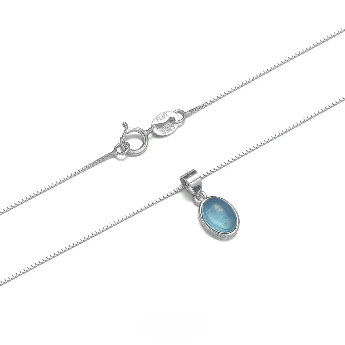 Oval Aquamarine Snake Chain Pendant Necklace pendant and chain detail on a light background