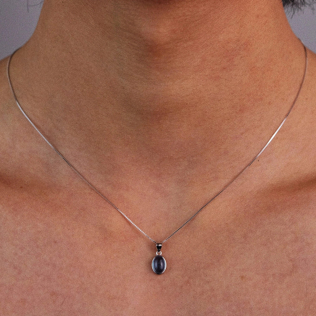 Oval Aquamarine Snake Chain Pendant Necklace styled neckline view showing pendant scale