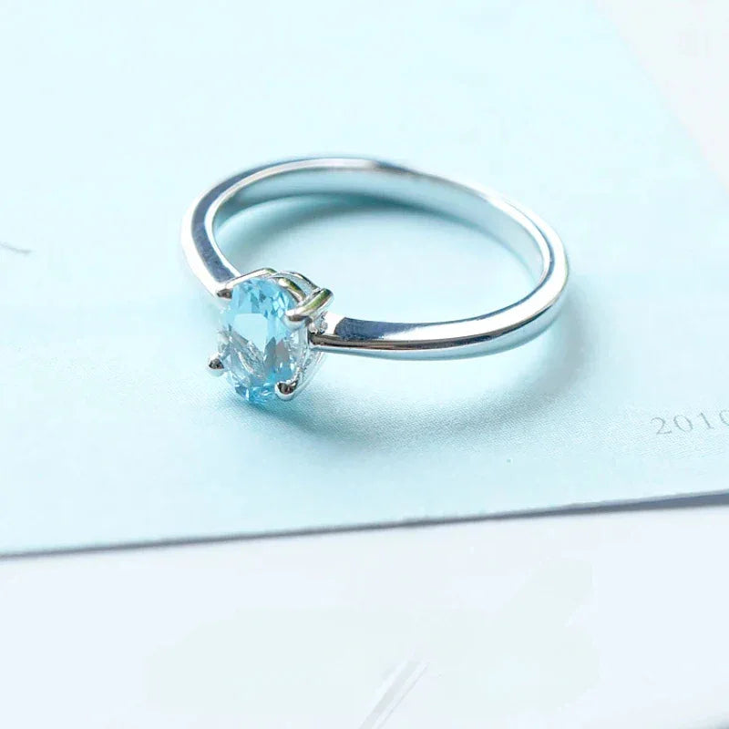 Oval Aquamarine Solitaire Ring angled product view showing the setting