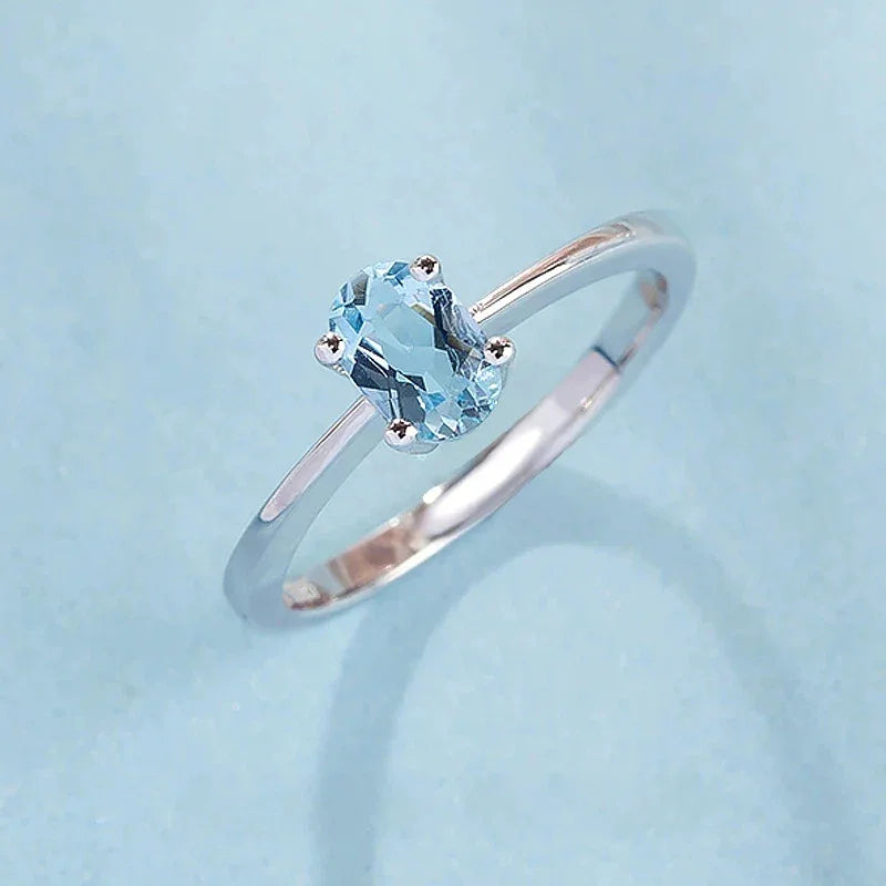 Oval Aquamarine Solitaire Ring side profile showing the band and setting