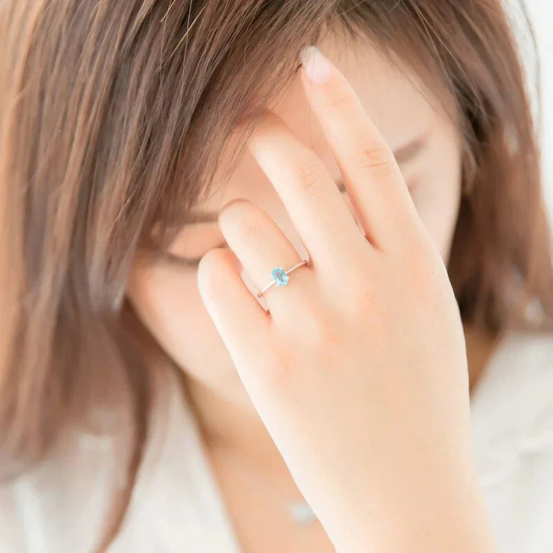 Oval Aquamarine Solitaire Ring worn on the hand from a second angle