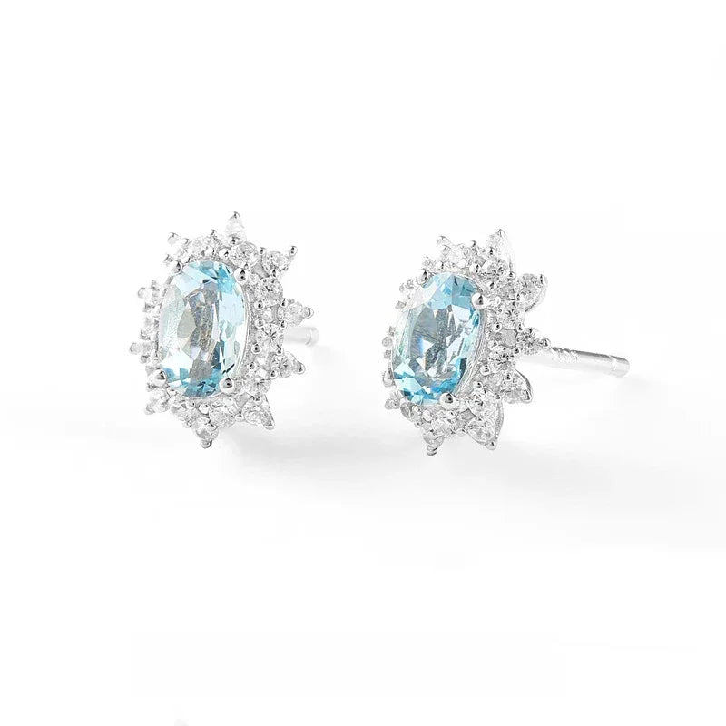 Oval Aquamarine Starburst Halo Stud Earrings side view showing posts and settings