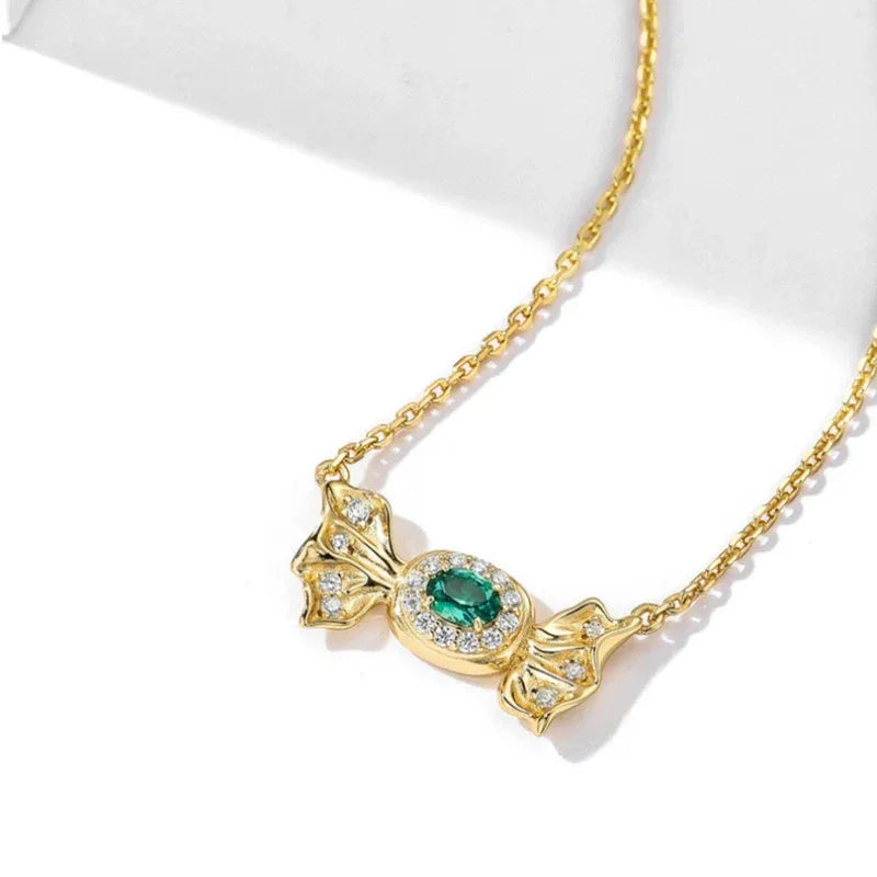 Oval Emerald Butterfly Necklace pendant and chain detail on white