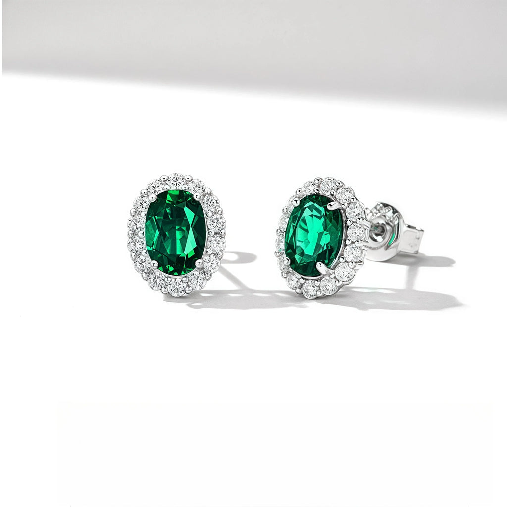 Oval Emerald Halo Stud Earrings side view showing posts and settings