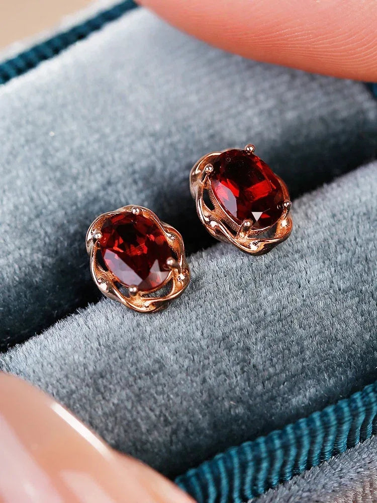 Oval Garnet Bezel Stud Earrings rear and band detail view