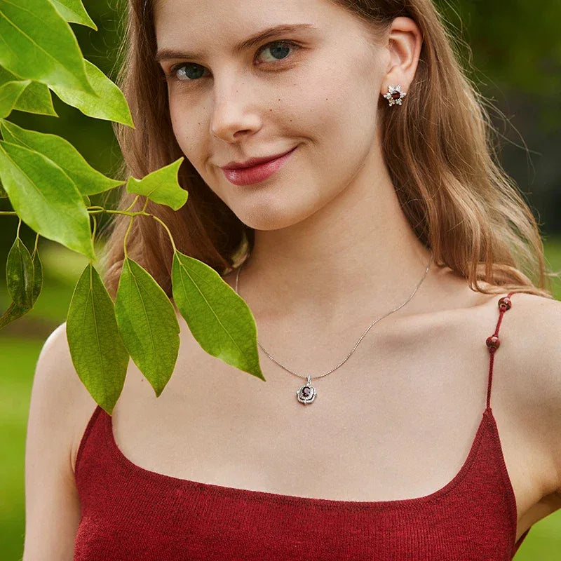 Oval Garnet Ornate Pendant Necklace close-up of the pendant and chain