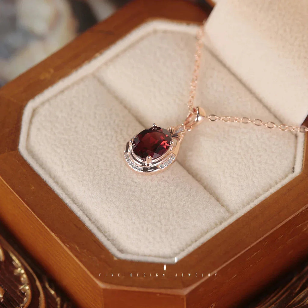 Oval Garnet Teardrop Pendant Necklace close-up of the pendant and chain