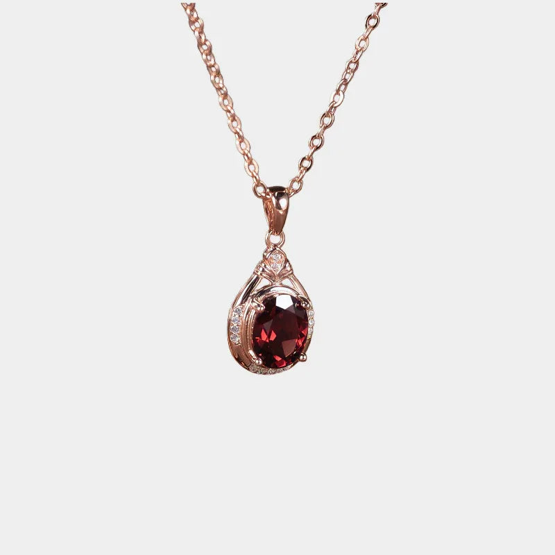 Oval Garnet Teardrop Pendant Necklace full necklace view on a light background