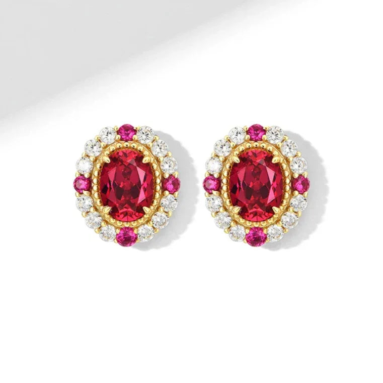 Oval Ruby Gold-Tone Stud Earrings — earrings worn on ear 7