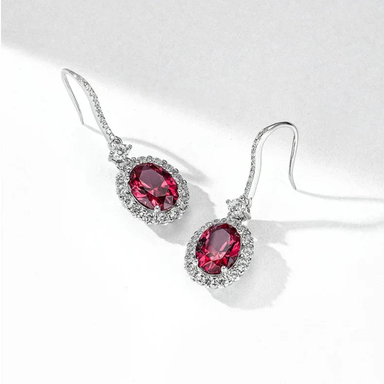 Oval Ruby Halo Drop Earrings — specification card with material and size details