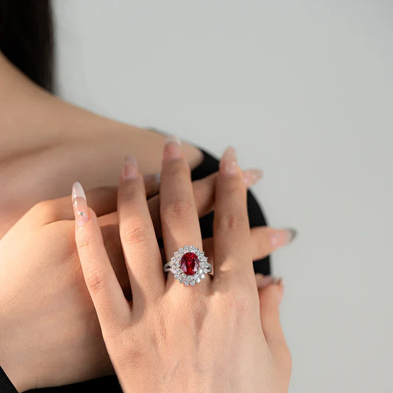 Oval Ruby Halo Statement Ring — angled ring view