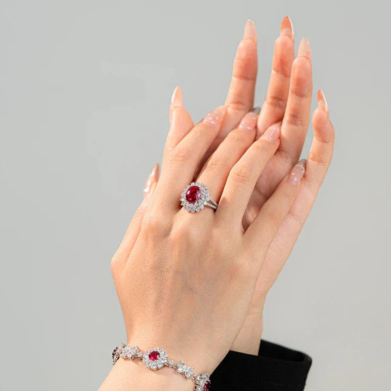 Oval Ruby Halo Statement Ring — ring worn on hand