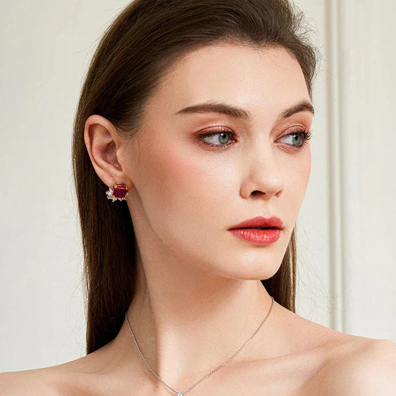 Oval Ruby Starburst Pendant Necklace — necklace worn at neckline