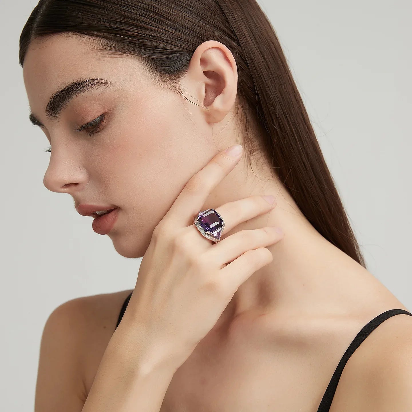 oversized amethyst open ring styled portrait showing the ring for scale
