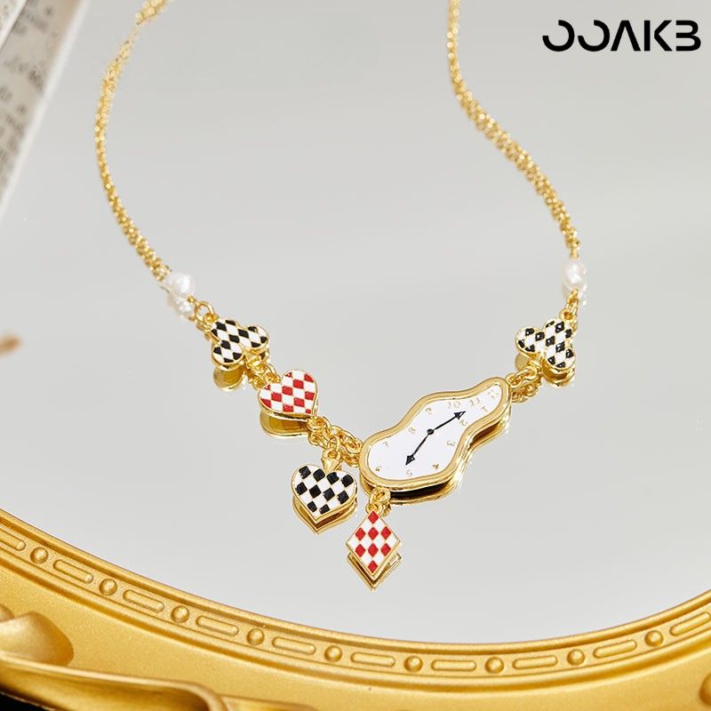 Close-up of the enamel clock necklace: irregular clock face, checkered motifs, and red hearts—crafted for paper anniversary customization.