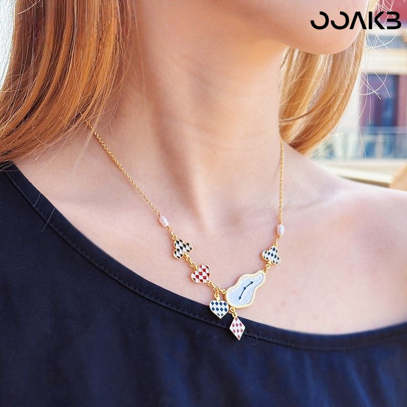 Model wearing the Alice-inspired clock necklace, featuring whimsical black-white squares and red hearts—ideal for a paper wedding gift with customizable charm.