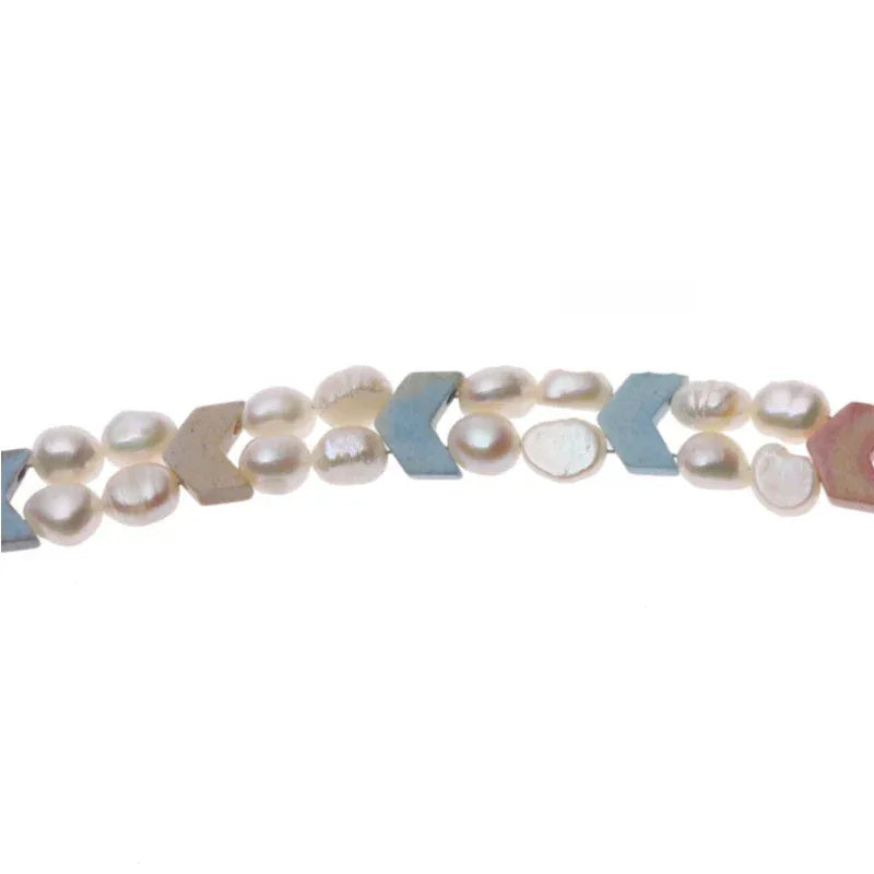 Pastel Baroque Pearl Double-Strand Bracelet — macro view of pale pearls and blue, pink and cream geometric accents