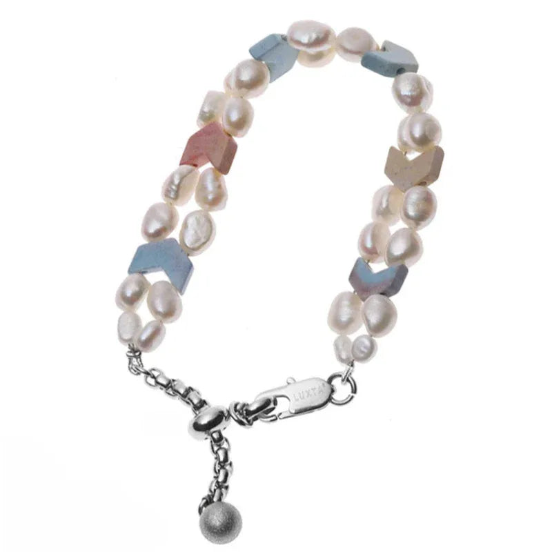 Pastel Baroque Pearl Double-Strand Bracelet — angled product view showing the clasp and ball charm