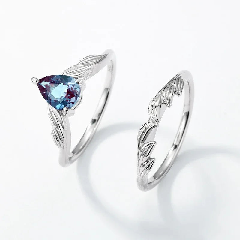 Pear-cut Alexandrite leaf stack ring, separated ring set shown on a white background