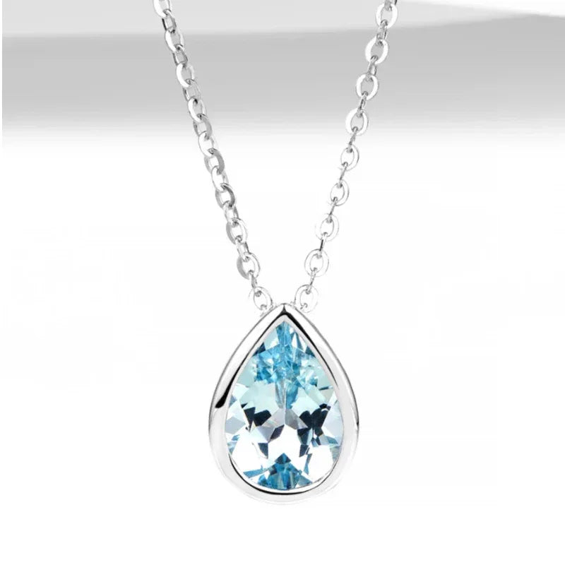Pear-Cut Aquamarine Bezel Pendant Necklace angled pendant detail on white
