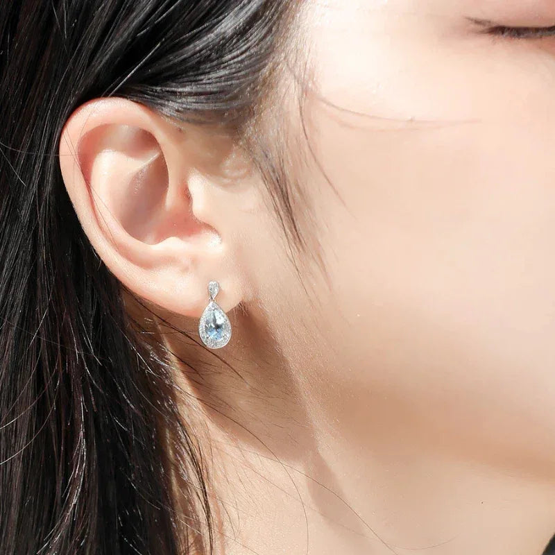 Pear-Cut Aquamarine Halo Drop Earrings side view showing posts and settings