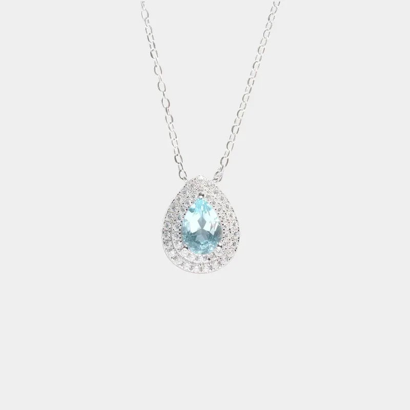Pear-Cut Aquamarine Halo Pendant Necklace full necklace view on a white background