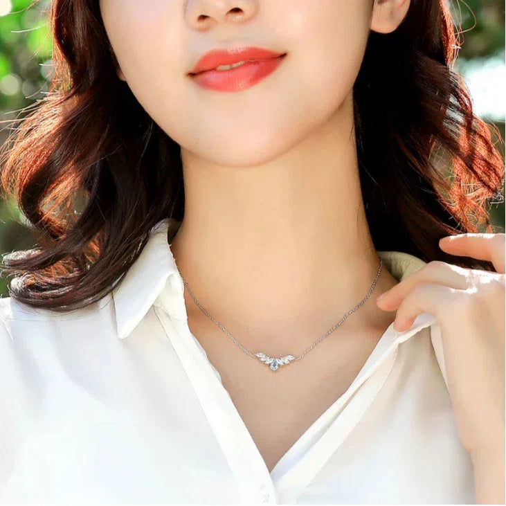 Pear-Cut Aquamarine Leaf Accent Necklace styled neckline view showing pendant scale