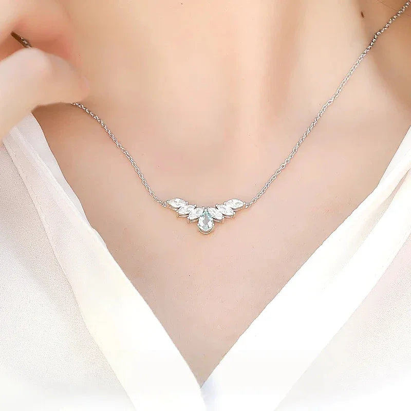 Pear-Cut Aquamarine Leaf Accent Necklace worn at the neckline from a second angle