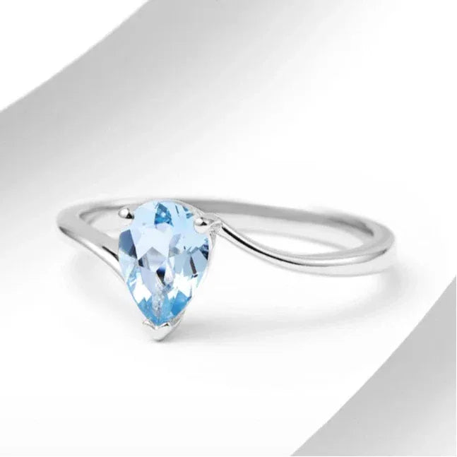 Pear-Cut Aquamarine Open Ring angled product view showing the setting