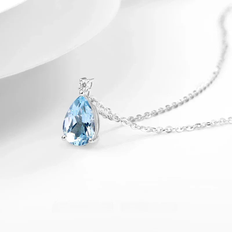 Pear-Cut Aquamarine Pendant Necklace angled pendant detail on white